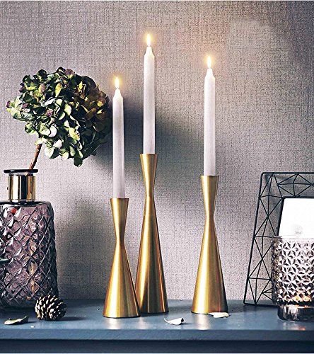 hourglass shaped gold metal candle sticks