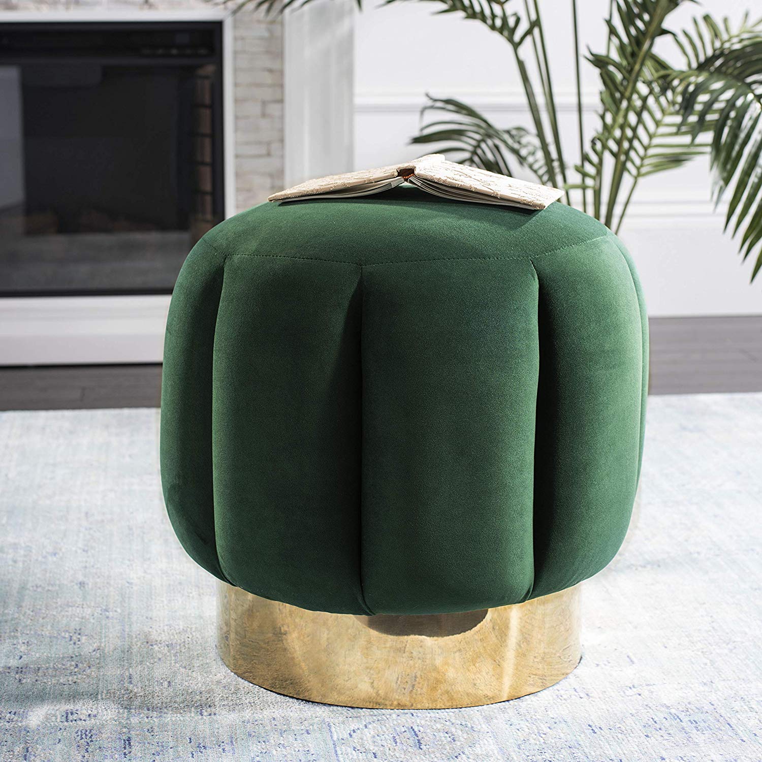 round green velvet ottoman with gold bottom