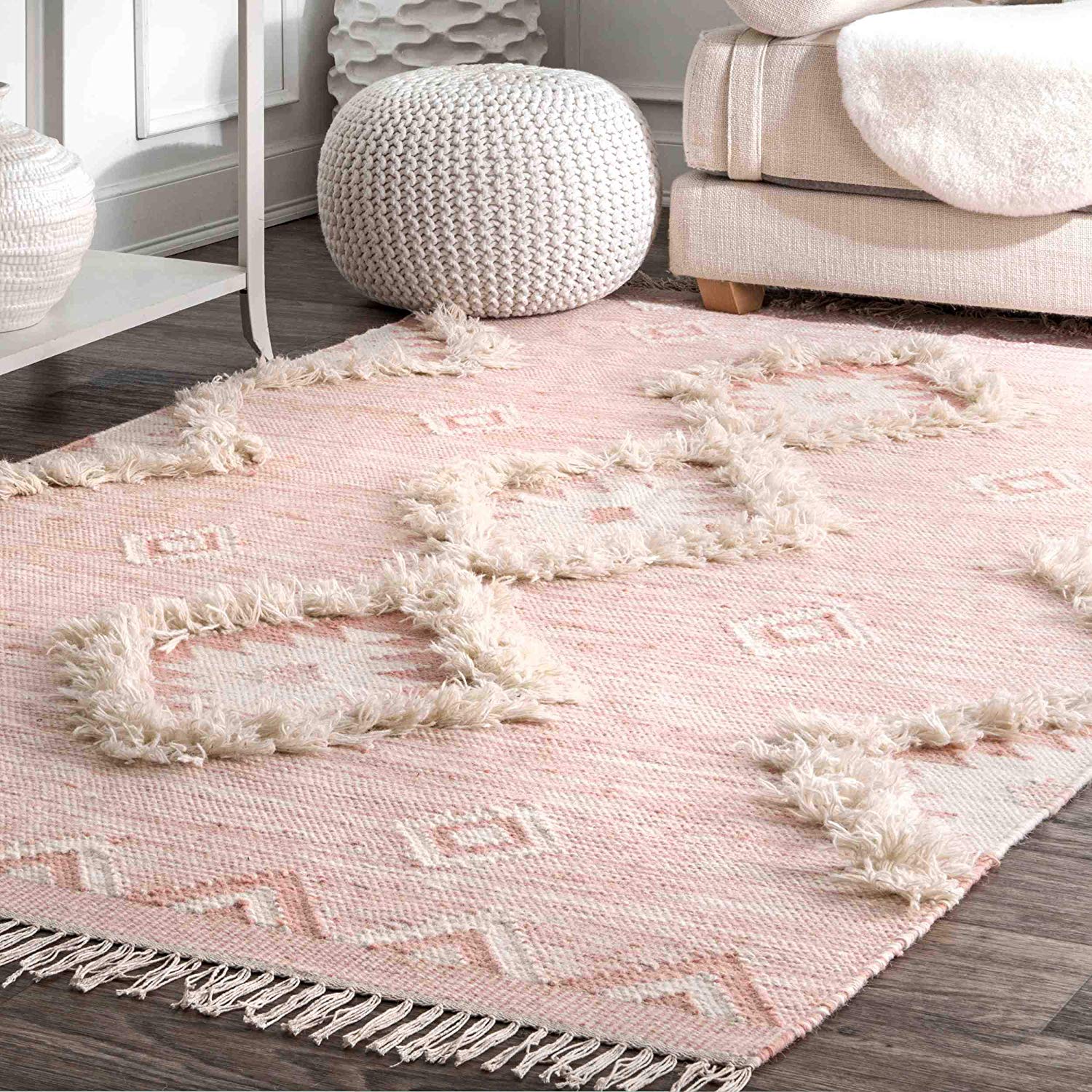 pink bohemian scandinavian area rug with tassels