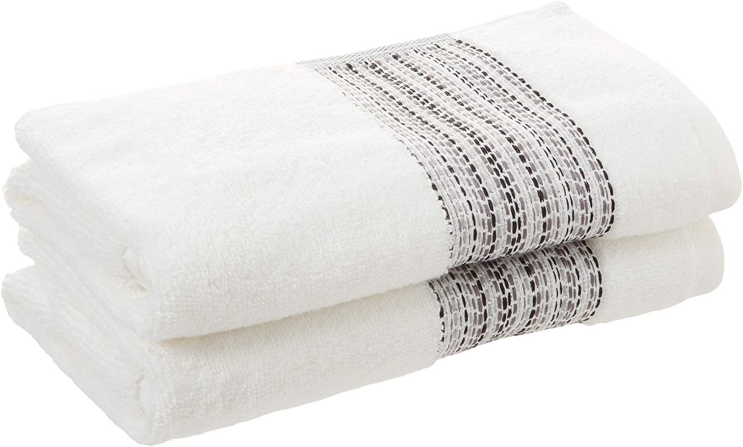 two fluffy white towels with gray and beige designs
