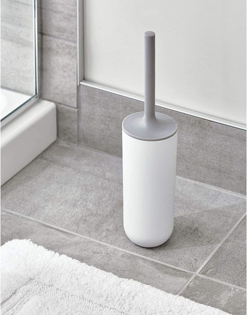 white round toilet brush with light gray handle