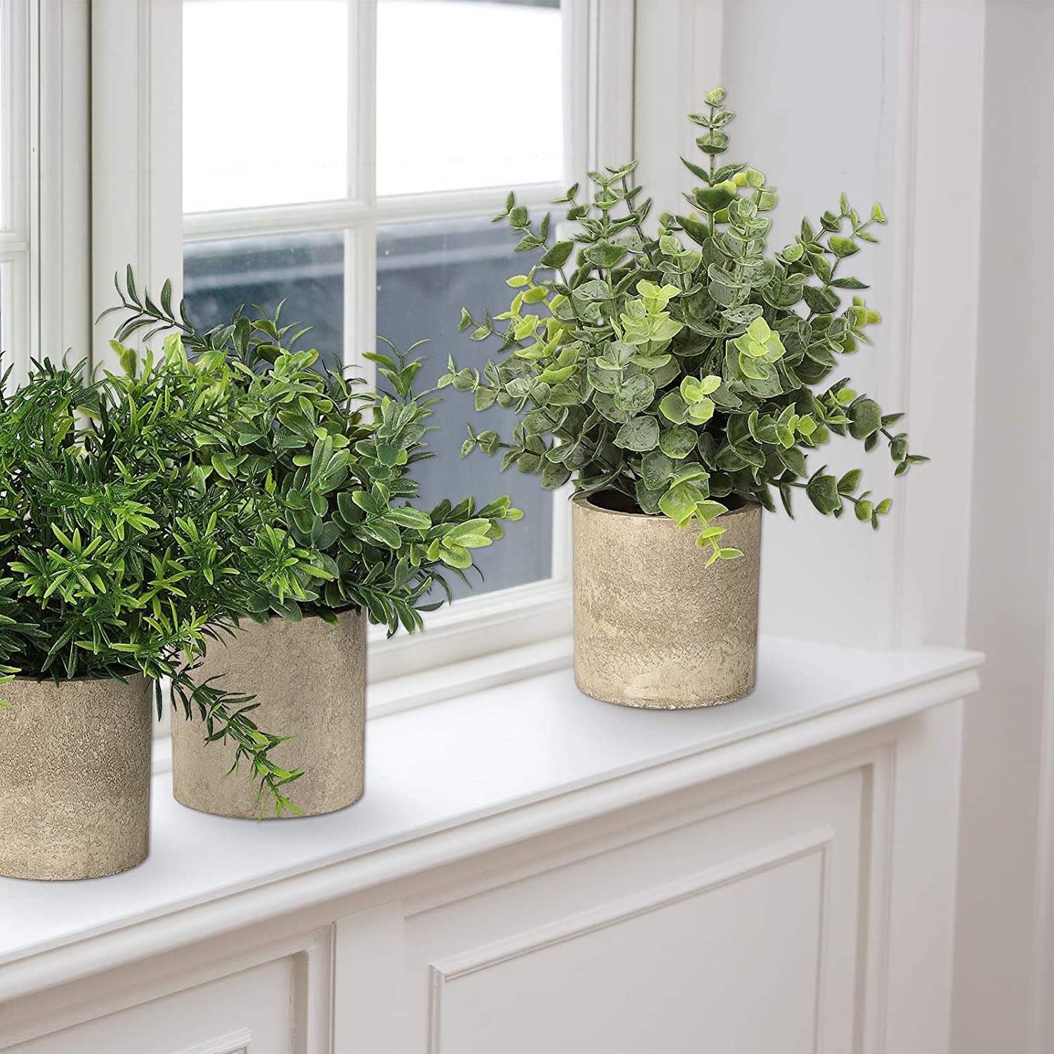 small fauz green plants in pots
